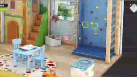 Детская игровая со скалодромом, столиком и игрушками на ковре
